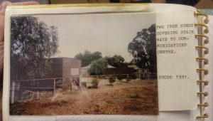 Two corrugated iron sheds concealing bunker entrances.